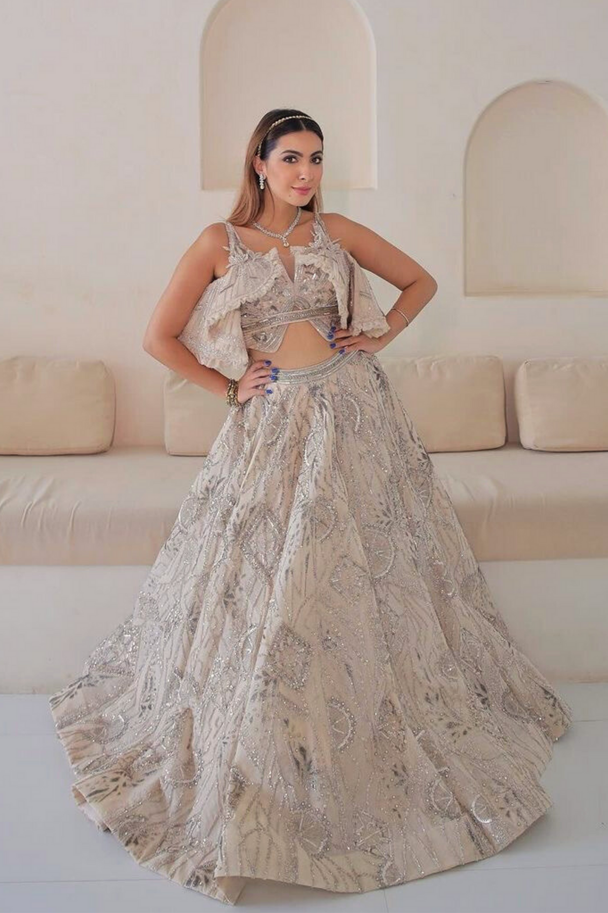 Niki Mehra in Blushed Pastel Wings Lehenga